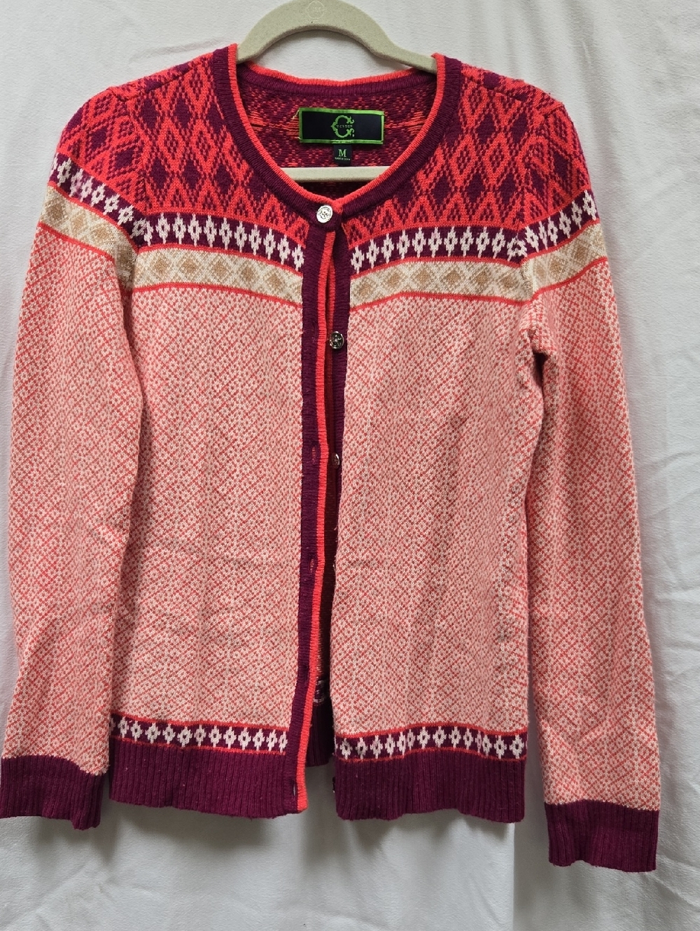 C. Wonder Pink and Red Patterned Cardigan with Cream Accents